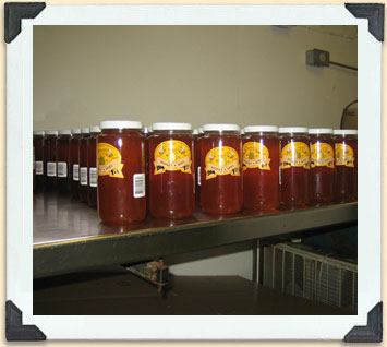 These jars of honey are ready to be boxed and then shipped to retail locations. 
